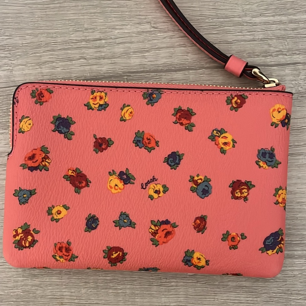 Floral pink Coach wristlet wallet